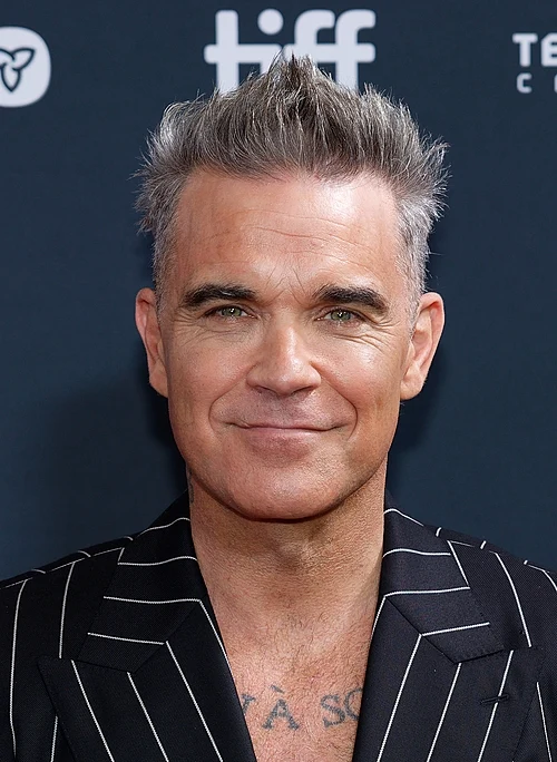 Robbie Williams autisme: de test die het miste, en de diagnose die het alsnog vond